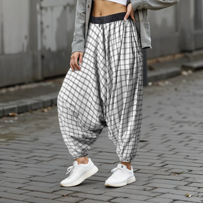 Dopehead Unisex Harem Pant with breathable fabric, customized fitting, side pockets, Boho Artist Vibe, available in all sizes—designed by Dopehead for bold urban style and everyday comfort. Dopehead Unisex Harem Pant styled for a streetwear look.
