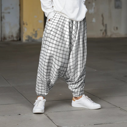 Dopehead Unisex Harem Pant with breathable fabric, customized fitting, side pockets, Boho Artist Vibe, available in all sizes—designed by Dopehead for bold urban style and everyday comfort. Dopehead Unisex Harem Pant styled for a streetwear look.